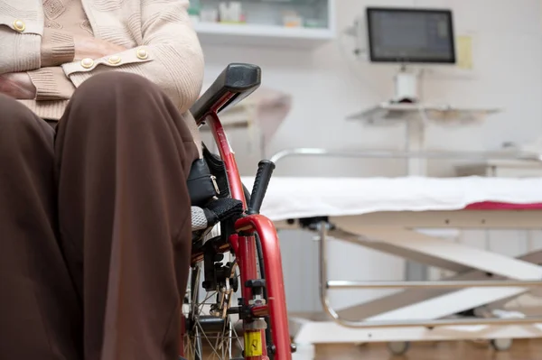 stock image Senior woman patient on wheelchair at rehabilitation physiotherapy clinic or doctor office, unrecognizable elder woman. High quality photo. High quality photo