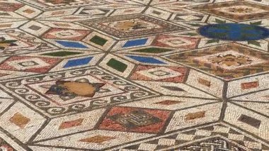 İspanya 'nın Clunia Sulpicia, Burgos, Kastilya ve Leon harabelerindeki antik Roma mozaiğine yakından bakın. Yüksek kalite 4k görüntü