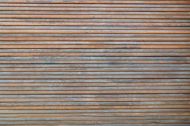 Yatay olarak eski tahta çıtalardan yapılmış bir yüzey. Daha fazla grafik çalışması için arkaplan veya doku