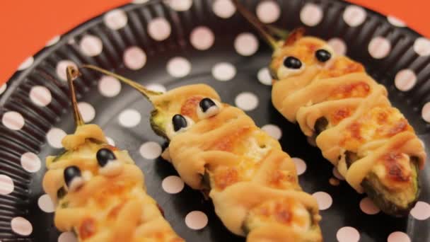 Jalapeno Pepper Mummies Stuffed Cheese Spooky Halloween Snack Gratin Cheese — Stock Video