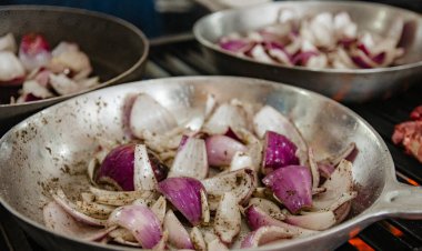 onion cut and placed in a pan ready to roast and use in your different meals