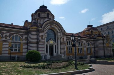  Sofia, Bulgaria -  August 29, 2024: Central public mineral bath in Sofia, built between 1906 and 1913,  medieval Banski square, Bulgaria, Europe. Visit in place.  clipart