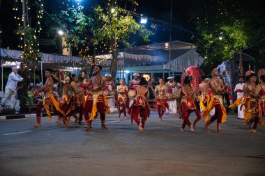 Colombo, Sri Lanka. 06 febfuary 2023. large carnival festive procession with elephants and dancers in bright national costumes through the streets of Colombo
