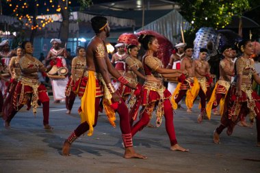 Colombo, Sri Lanka. 06 febfuary 2023. large carnival festive procession with elephants and dancers in bright national costumes through the streets of Colombo