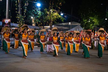 Colombo, Sri Lanka. 06 febfuary 2023. large carnival festive procession with elephants and dancers in bright national costumes through the streets of Colombo