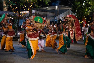 Colombo, Sri Lanka. 06 febfuary 2023. large carnival festive procession with elephants and dancers in bright national costumes through the streets of Colombo