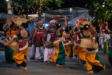 Colombo, Sri Lanka. 06 febfuary 2023. large carnival festive procession with elephants and dancers in bright national costumes through the streets of Colombo