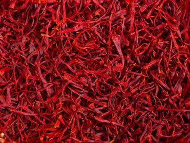 Makro çekim ve safranın İspanya 'dan üst görüntüsü detaylar ve çok yakından büyütülmüş hali. İdeal yemek ve baharat safranları.