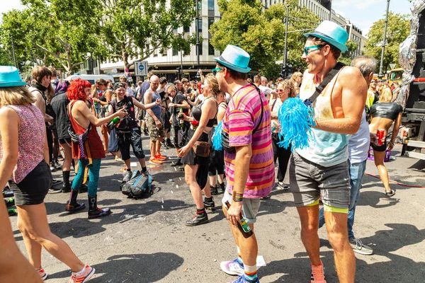 stock image Berlin, Germany, 27 july, 2019. Bright 41th Berlin Pride street festival. Smartly dressed people with posters, calls for freedom and tolerance