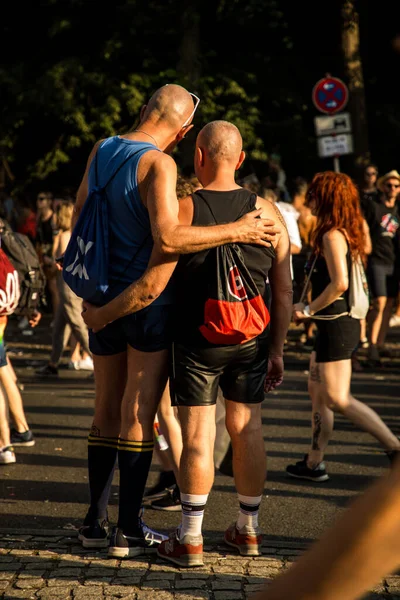 stock image Berlin, Germany, 27 july, 2019. Bright 41th Berlin Pride street festival. Smartly dressed people with posters, calls for freedom and tolerance