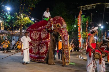 Colombo, Sri Lanka. 06 febfuary 2023. large carnival festive procession with elephants and dancers in bright national costumes through the streets of Colombo