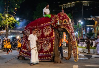 Colombo, Sri Lanka. 06 febfuary 2023. large carnival festive procession with elephants and dancers in bright national costumes through the streets of Colombo