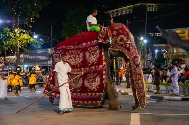 Colombo, Sri Lanka. 06 febfuary 2023. large carnival festive procession with elephants and dancers in bright national costumes through the streets of Colombo