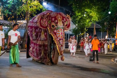Colombo, Sri Lanka. 06 febfuary 2023. large carnival festive procession with elephants and dancers in bright national costumes through the streets of Colombo