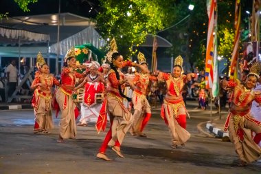 Colombo, Sri Lanka. 06 febfuary 2023. large carnival festive procession with elephants and dancers in bright national costumes through the streets of Colombo