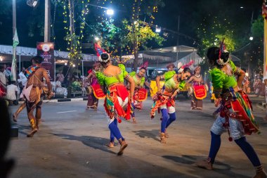 Colombo, Sri Lanka. 06 febfuary 2023. large carnival festive procession with elephants and dancers in bright national costumes through the streets of Colombo