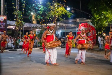Colombo, Sri Lanka. 06 febfuary 2023. large carnival festive procession with elephants and dancers in bright national costumes through the streets of Colombo