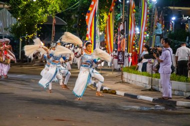 Colombo, Sri Lanka. 06 febfuary 2023. large carnival festive procession with elephants and dancers in bright national costumes through the streets of Colombo