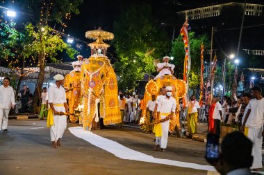 Colombo, Sri Lanka. 06 febfuary 2023. large carnival festive procession with elephants and dancers in bright national costumes through the streets of Colombo