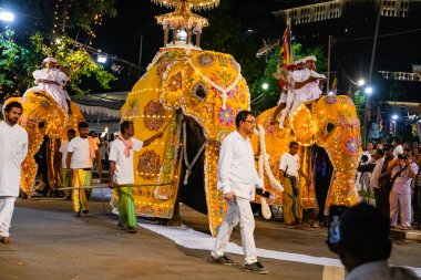 Colombo, Sri Lanka. 06 febfuary 2023. large carnival festive procession with elephants and dancers in bright national costumes through the streets of Colombo