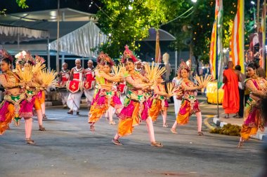 Colombo, Sri Lanka. 06 febfuary 2023. large carnival festive procession with elephants and dancers in bright national costumes through the streets of Colombo