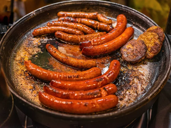 stock image meat food concept. grilled homemade sausages in a pan with fat