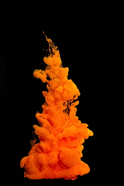 Orange Acrylic colors ink in water isolated Abstract and bright. subject photo, cosmetics, drinks and advertising concept .