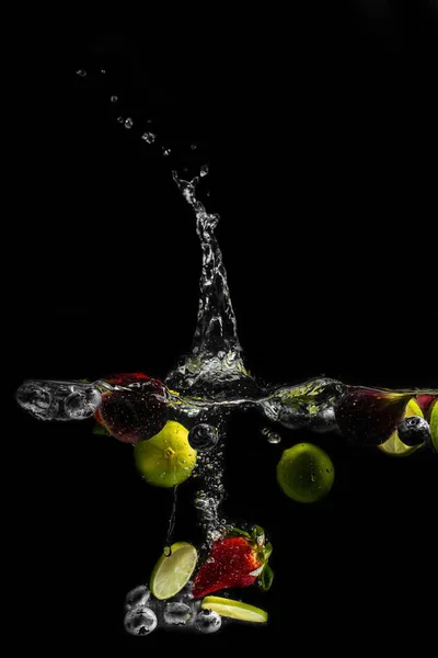 Bright Juicy Fruits Splashes Fly Aquarium Black Background — Stock Photo, Image
