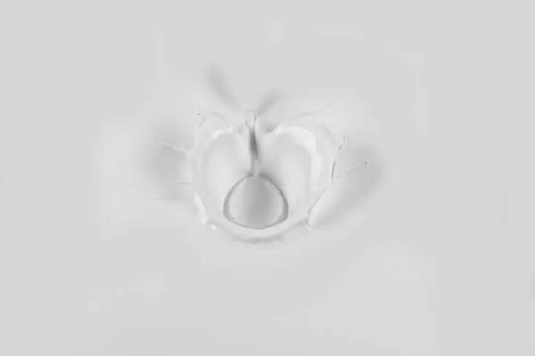collection of various milk splashes on white background. cosmetics milk, white paint splash, perfume, drop and hit concept.