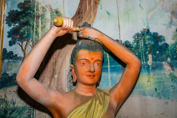 stock image Balapitya Purana Viharay, Sri Lanka. 07. 02. 2023 Sri Pushparama temple interior. figures depicting entire history Buddha, starting from birth. Buddha cuts off his hair and becomes a monk