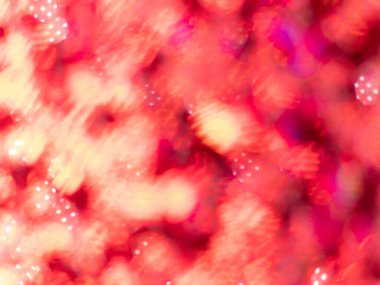 Turuncu ve kırmızı renkli bokeh ile parlayan metalik pigment tozu. makro çekim arkaplanı