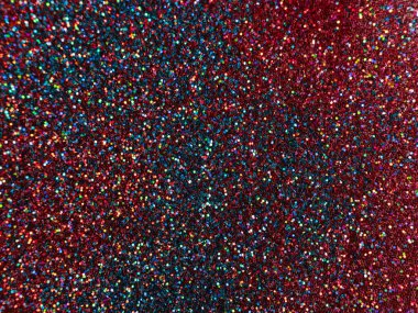 Turuncu ve kırmızı renkli bokeh ile parlayan metalik pigment tozu. makro çekim arkaplanı