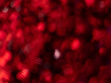 Turuncu ve kırmızı renkli bokeh ile parlayan metalik pigment tozu. makro çekim arkaplanı