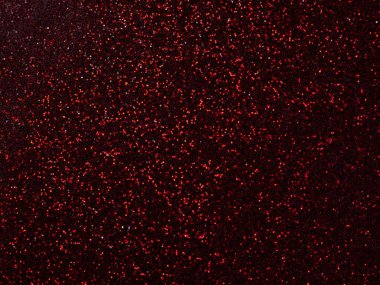 Turuncu ve kırmızı renkli bokeh ile parlayan metalik pigment tozu. makro çekim arkaplanı