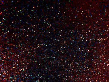 Turuncu ve kırmızı renkli bokeh ile parlayan metalik pigment tozu. makro çekim arkaplanı