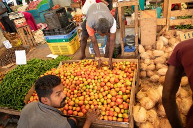 Colombo, Sri-Lanka. 03. 02. 2023. Crowded central food Market in Colombo. people sell things and food directly from street on small trays or directly from ground. traditional type of trade Sri Lanka clipart