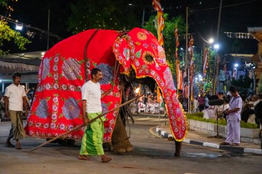 Colombo, Sri Lanka. 06 febfuary 2023. large carnival festive procession with elephants and dancers in bright national costumes through the streets of Colombo