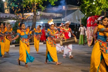 Colombo, Sri Lanka. 06 febfuary 2023. large carnival festive procession with elephants and dancers in bright national costumes through the streets of Colombo
