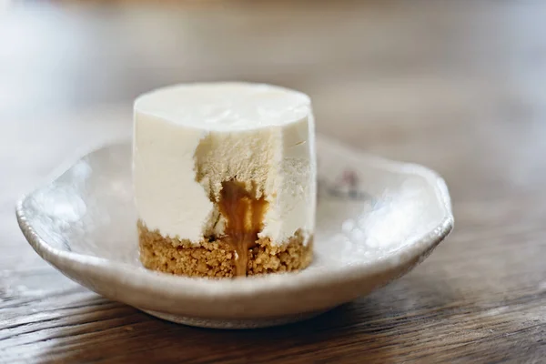 stock image cheesecake with caramel sauce on plate.