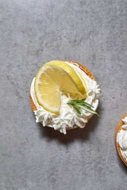Lemon tart, Homemade shortbread mini tart cakes with lemon curd and whipped crea