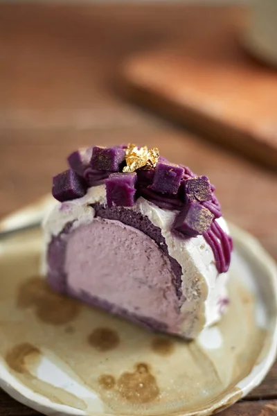 Purple sweet potato roll cake, selective focu