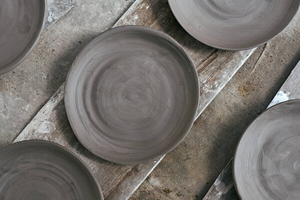 Empty ceramic Dish on rustic tabl