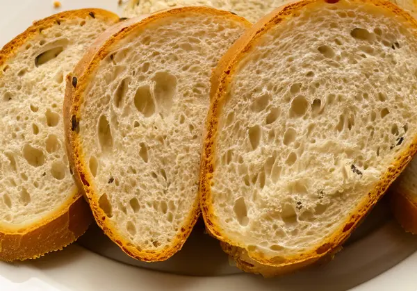 stock image Close up of bread slices in plate , blur backgroun