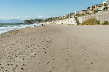 A beautiful beach located in Kamakura, Japan clipart