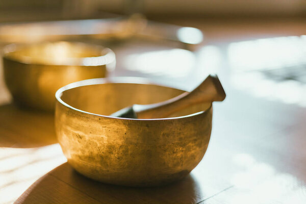 Tibetan singing copper bowl, alternative medicine.