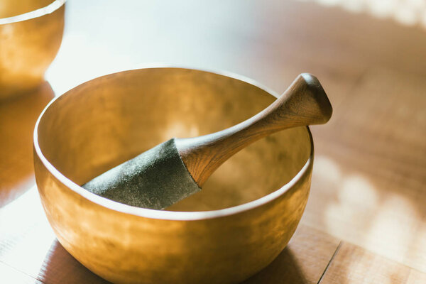Tibetan singing copper bowl, alternative medicine.
