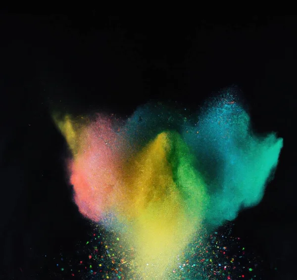 Explosion of colorful powder isolated on dark black background. Holi paint colour dust explode in freeze motion. Abstract multi color party paint splash. Rainbow smoke powder texture. Holi spice blust explosion. Generative AI art.