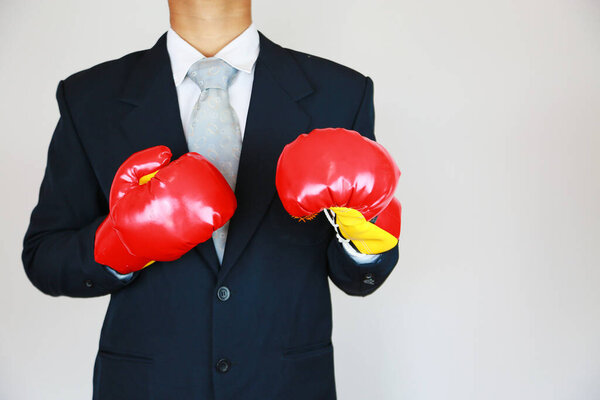 Businessman with suit and concept fight the business. Trader concept and action to fight with the business. Industry concept with businessman and acting for support presentation file.