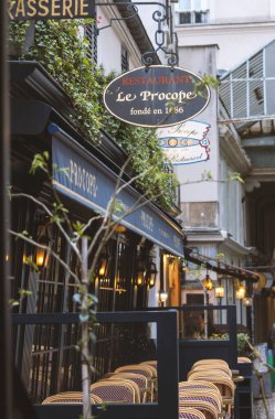 PARIS, FRANCE - APRIL 16, 2024: Brasserie PROCOPE with vintage decoration located in a 17th century building in Paris clipart