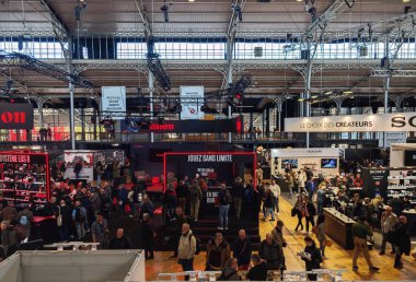 PARIS, FRANCE - October 11, 2024: Salon de la Photo, exhibition of all technological innovations at La Villette in 2024. clipart